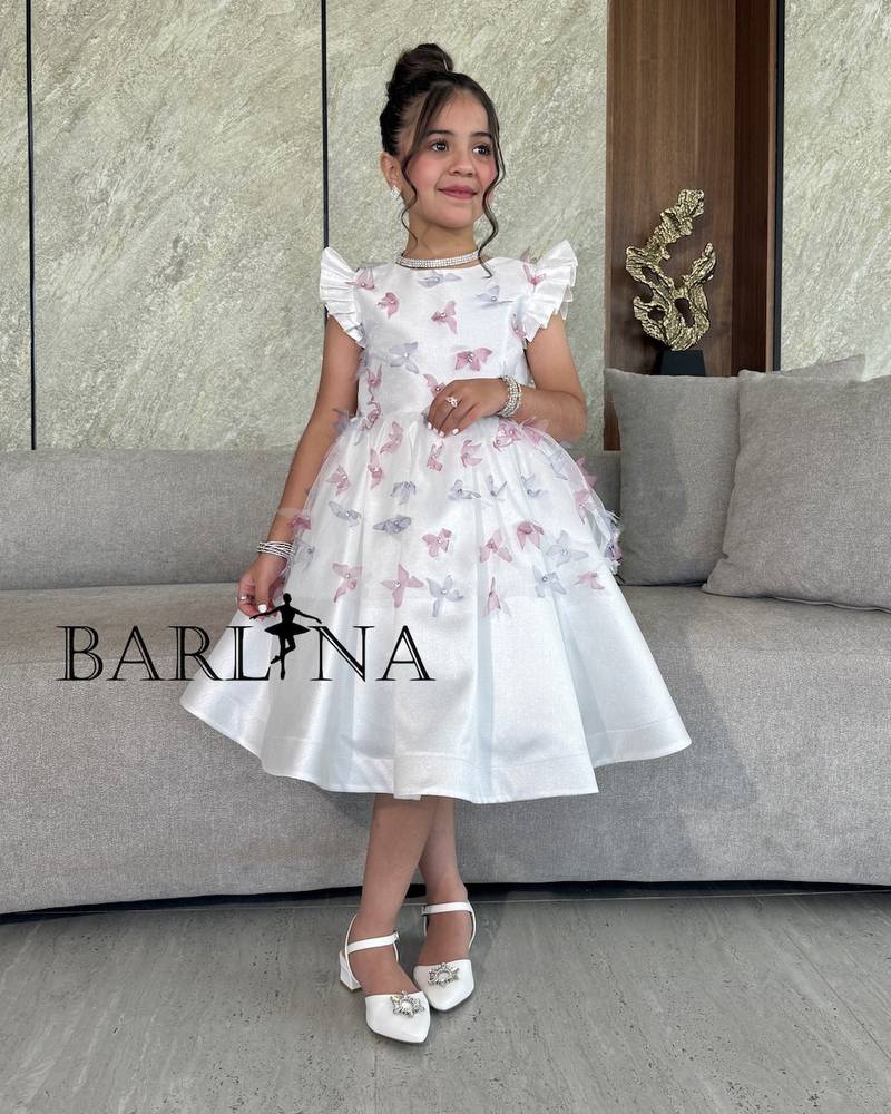 Girls' white dress with soft colorful butterflies