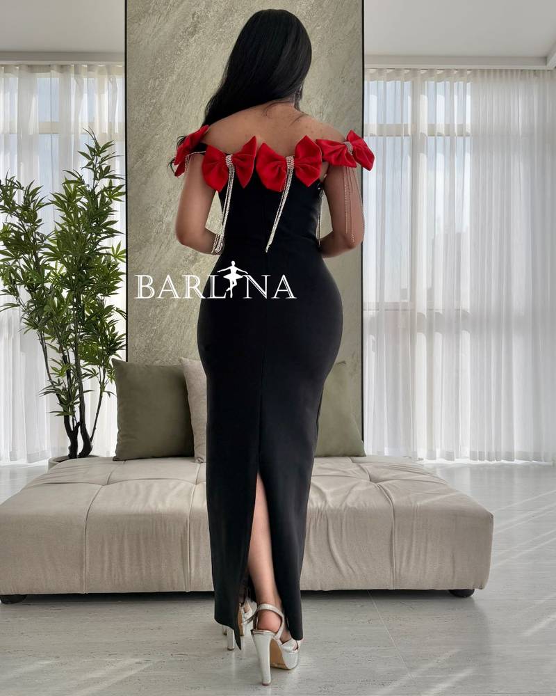A classic black dress with bows