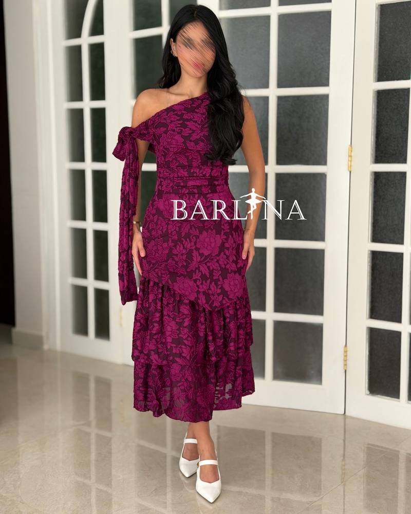 A soft midi dress with an elegant floral print