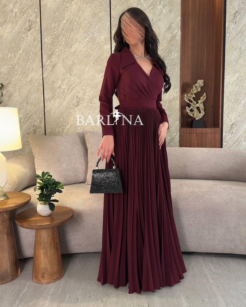 maroon dress with pleated folds