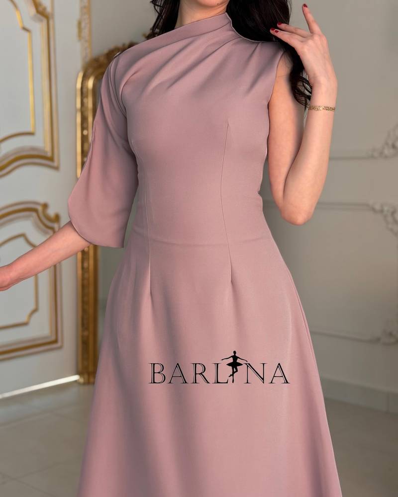 Soft pink dress with an asymmetrical shoulder cut