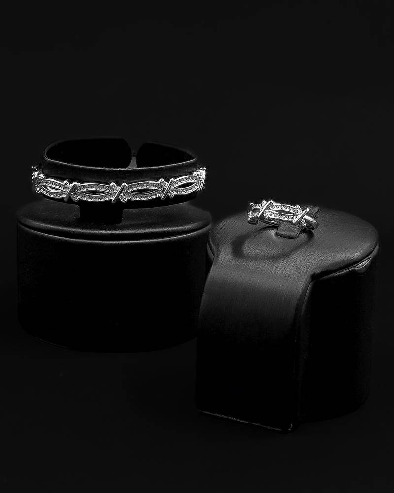 Bracelet and ring with a modern interlocking design