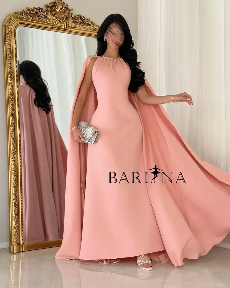 Pink occasion dress with a wide cape
