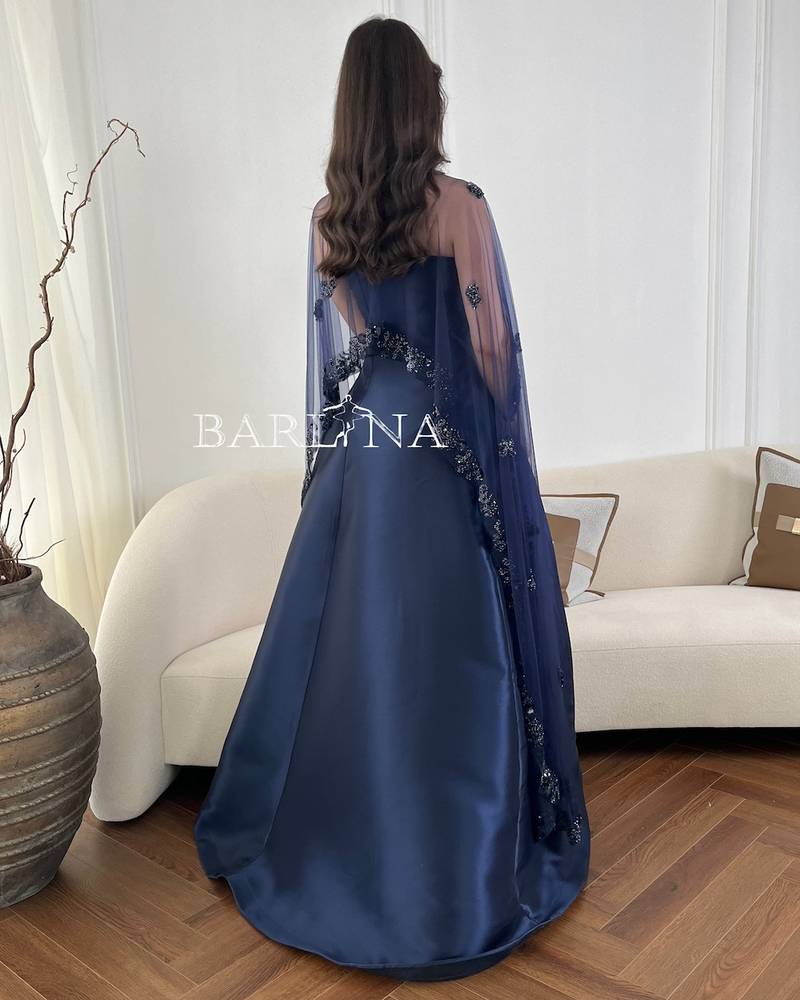 Long navy blue evening dress with a transparent cape