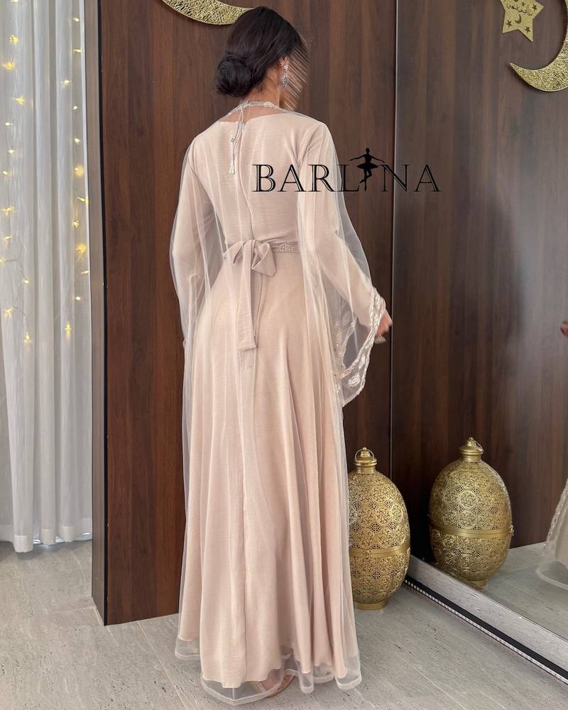 Luxurious beige jalabiya decorated with delicate embroidery