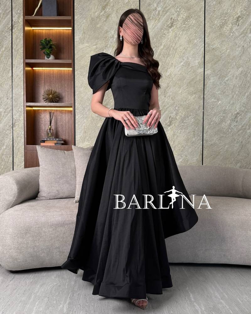 Black off-shoulder dress with slanted length