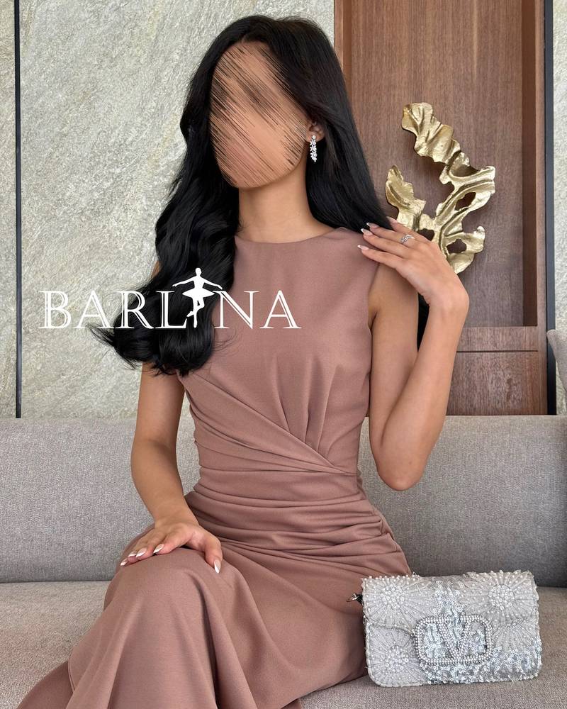 Elegant earthy dress with soft pleated details