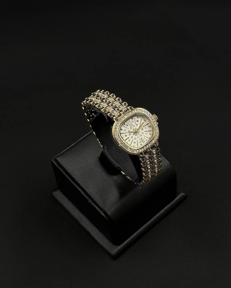 A dazzling women's watch fully studded