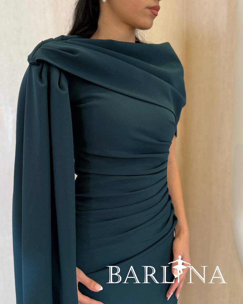 Soft petrol blue dress with draped details