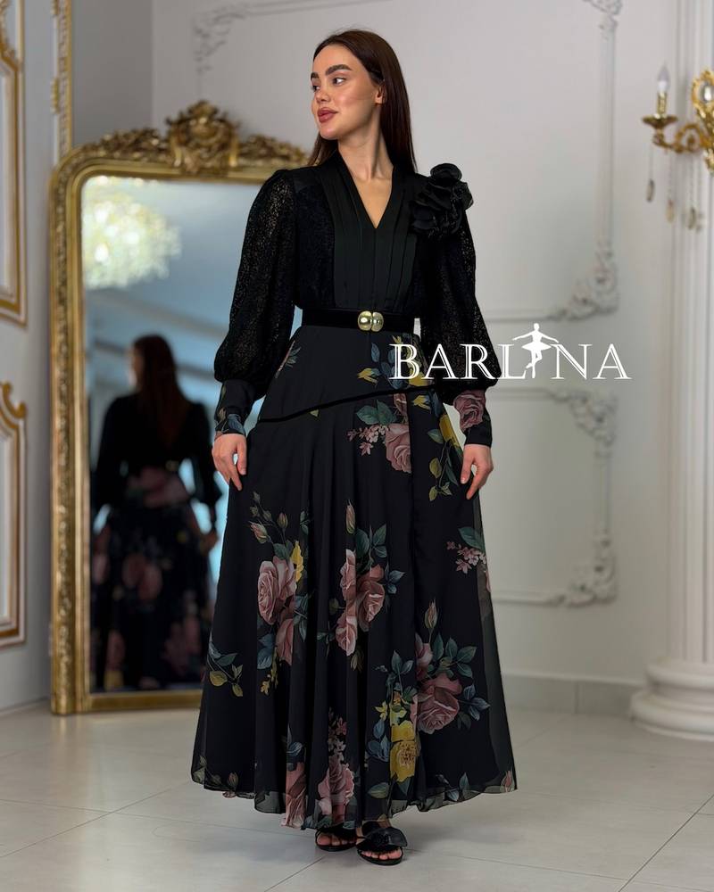 Long black floral dress with a belt