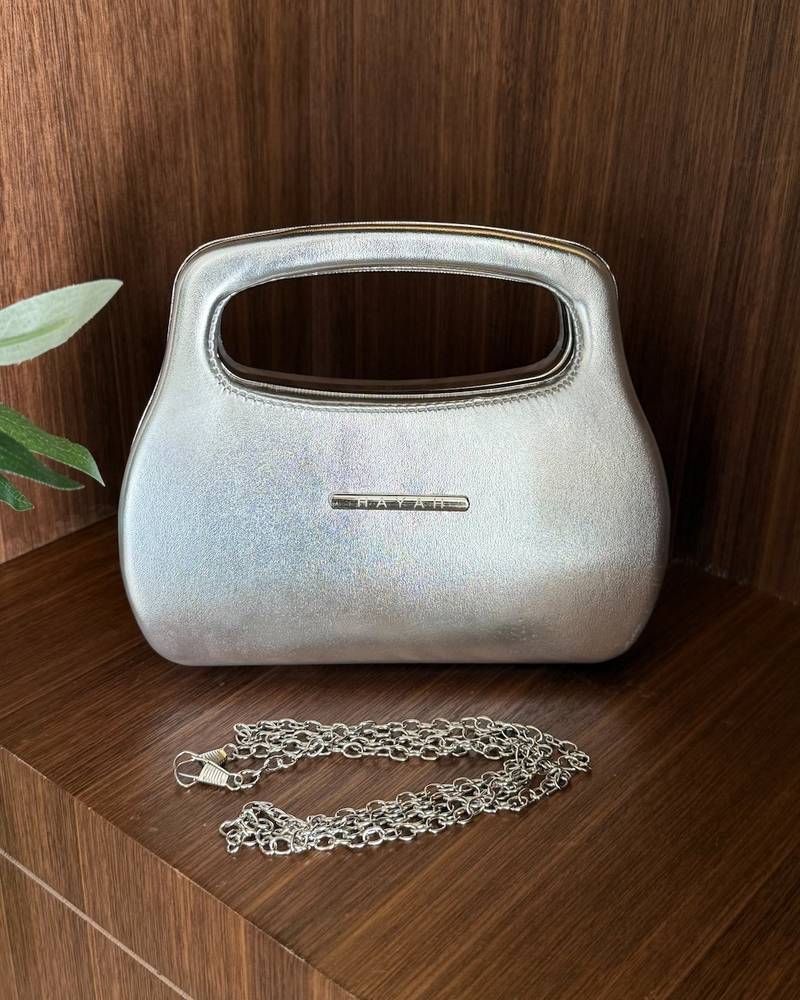 Leather handbag with a practical handle