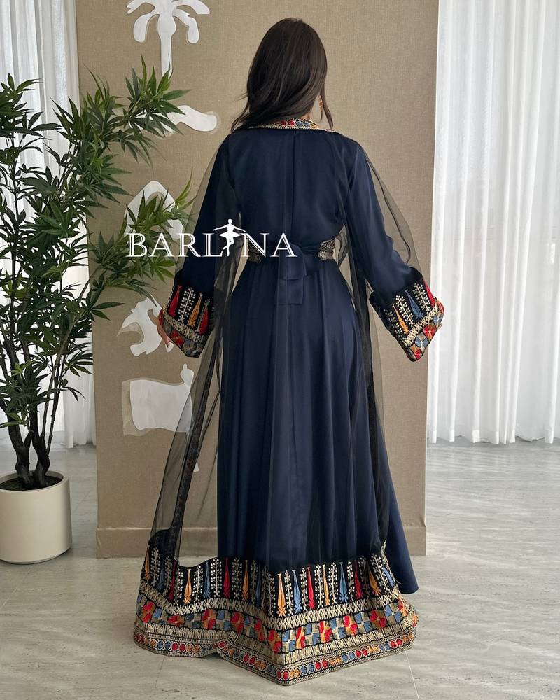 Navy blue jalabiya with colorful traditional embroidery