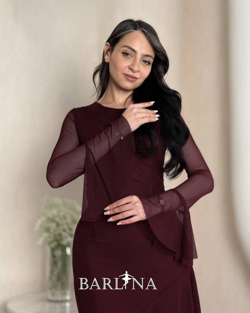 Burgundy dress with an asymmetrical cut