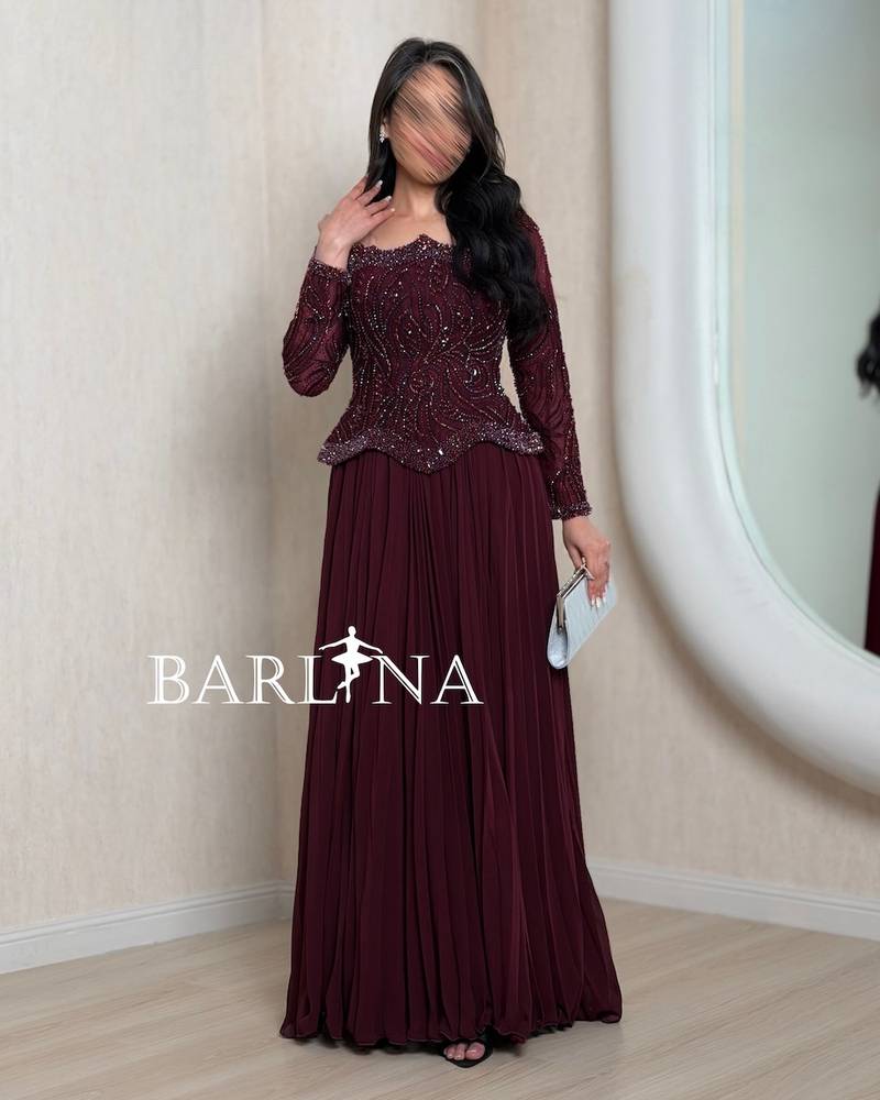 Maroon wide evening dress with luxurious embroidery