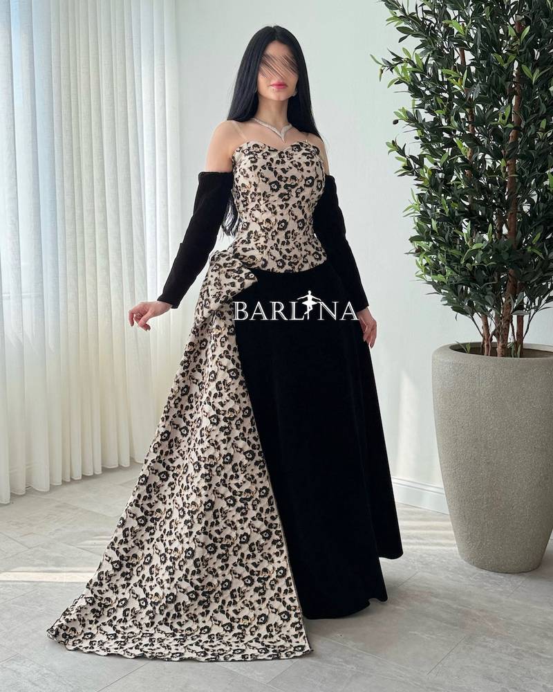 Black velvet dress with jacquard fabric embellishment