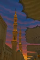 لوحة فنية جدارية كانفاس بإطار خشبي لمآذن المسجد النبوي عند الغروب