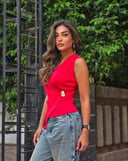 Red top with gold accessory 