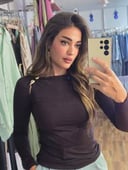 Brown top with gold accessory 