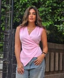 Pink top with gold accessory 