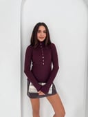 Burgundy top with gold buttons 