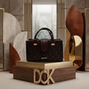 شنطة يد وسط بني قماش DKN