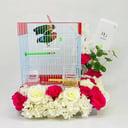 Two pairs of little parrot birds with a cage decorated with colorful artificial flowers-171