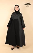 عباية بأزرار باللون الأسود بجاكار مشجر