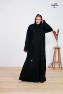 عباية أنيقة باللون الأسود بجيب مع شك ناعم