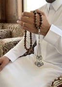 مسباح عقيق برازيلي ملكي - تموجات بنية وذهبية مع طربزونة فضية فاخرة