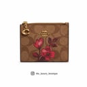 Coach bifold wallet light brown with pinkish flowers
