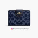 Medium Corner Zip Wallet In Signature canvas denim