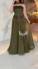 فستان سهرة زيتي فاخر بكورسيه مطرز 