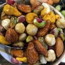 عسل بالمكسرات الطازجة والمقرمشة  ½ كيلو