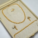 طقم اكابيلا ذهب 21