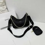 شنطة نسائية ماركة دكني  - اسود 1