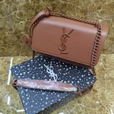 شنطة نسائية ماركة سان لوران  - بني