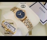 ساعه رجاليه ماركه قوتشي - ذهبي مينا اسود