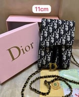 محفظة نسائية ماركة ديور - ابيض مع اسود