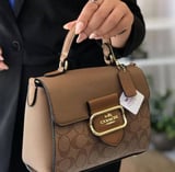 شنطة نسائية ماركة كوتش - بني فاتح