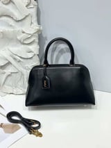 شنطة نسائية ماركة سان لوران  - اسود