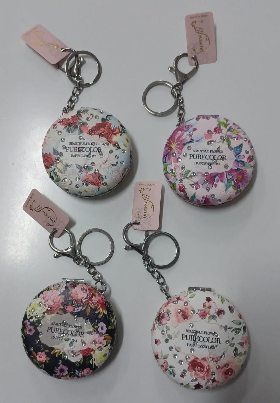 Floral-themed compact mirrors with keychain C4 \ G020524 - Image 1