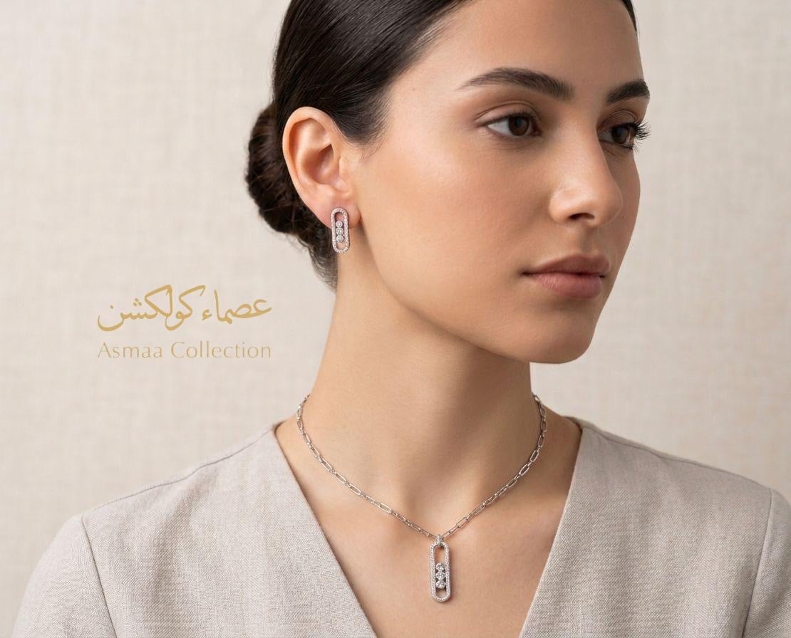طقم البريق المتحرك الفضي المرصع بالزركون (سلسال + حلق - صورة 1