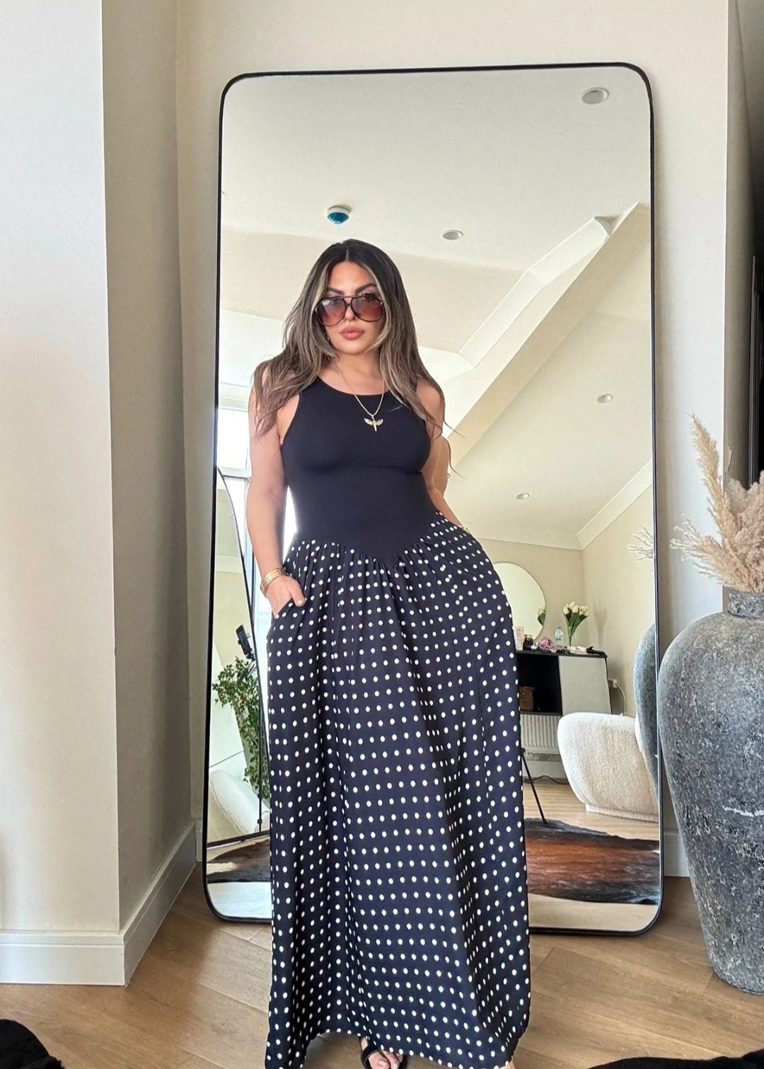 Black sleeveless polka dress - Image 1