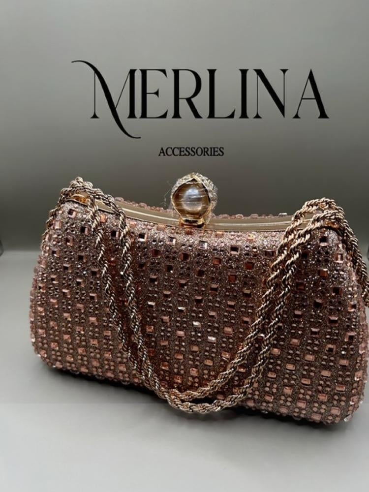 شنطة يد ذهبي بتصميم انيق مرصة فصوص - صورة 1