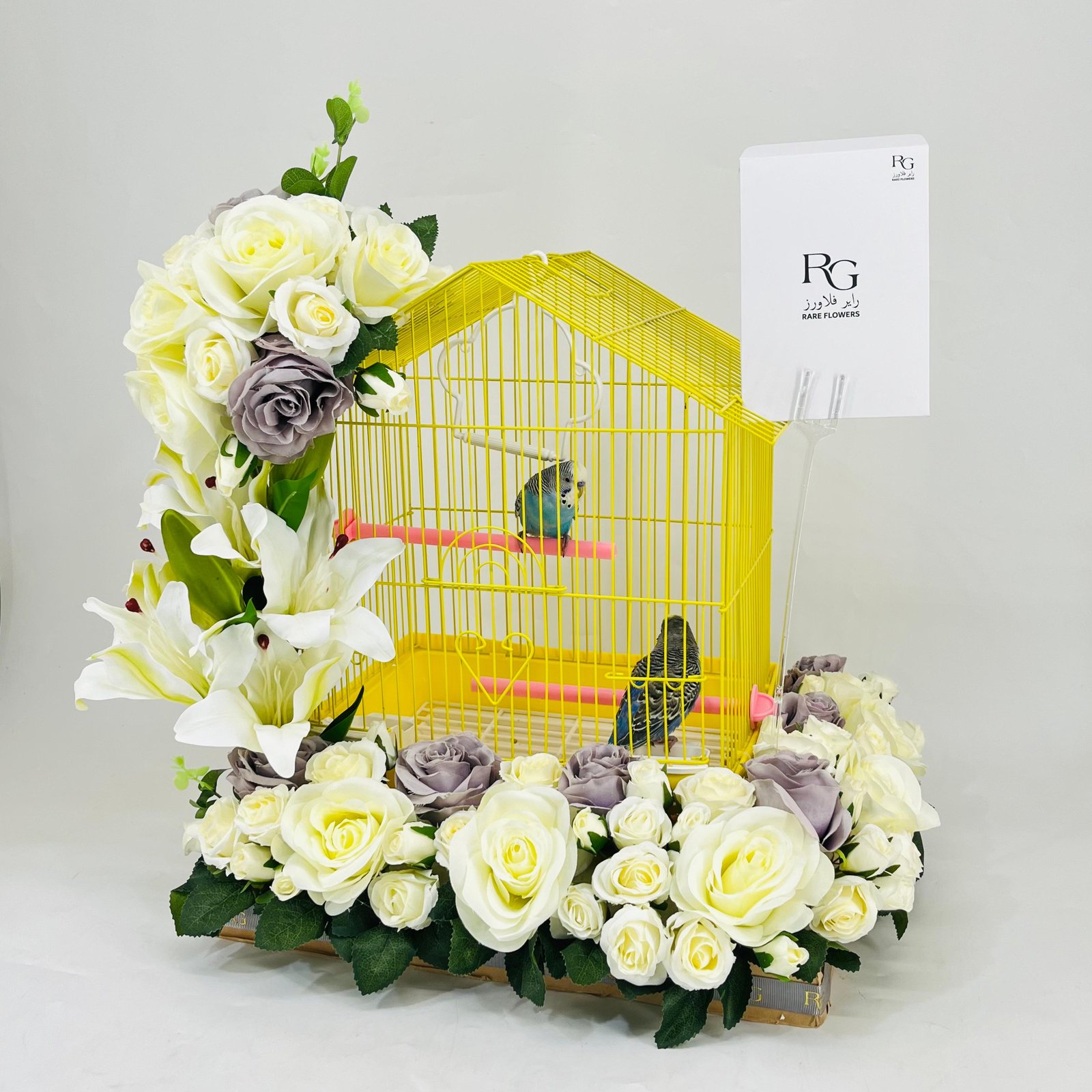A pair of budgies with a cage decorated with colorful artificial flowers-219 - Image 3