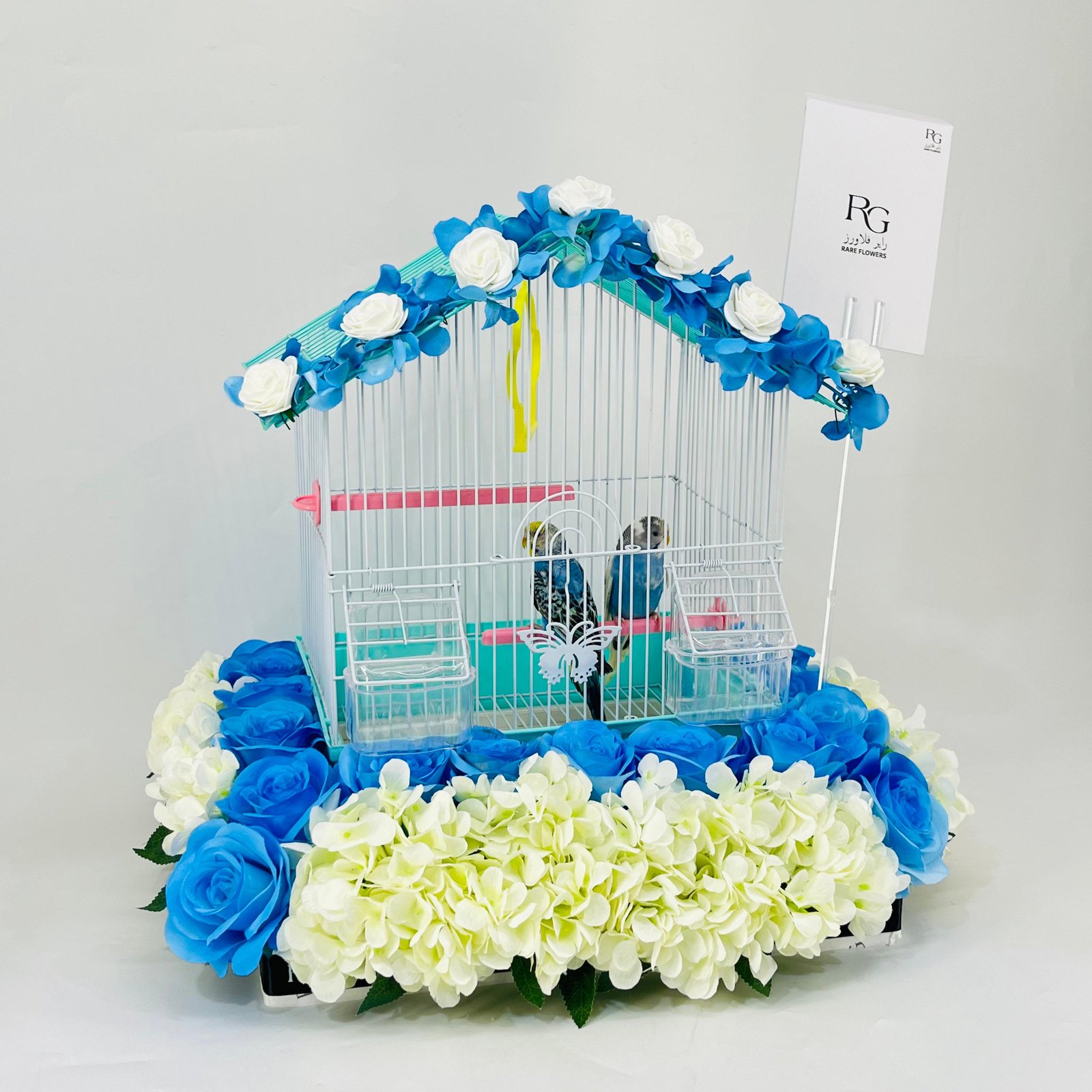 A pairs of budgies with colorful artificial flowers-316 - Image 2