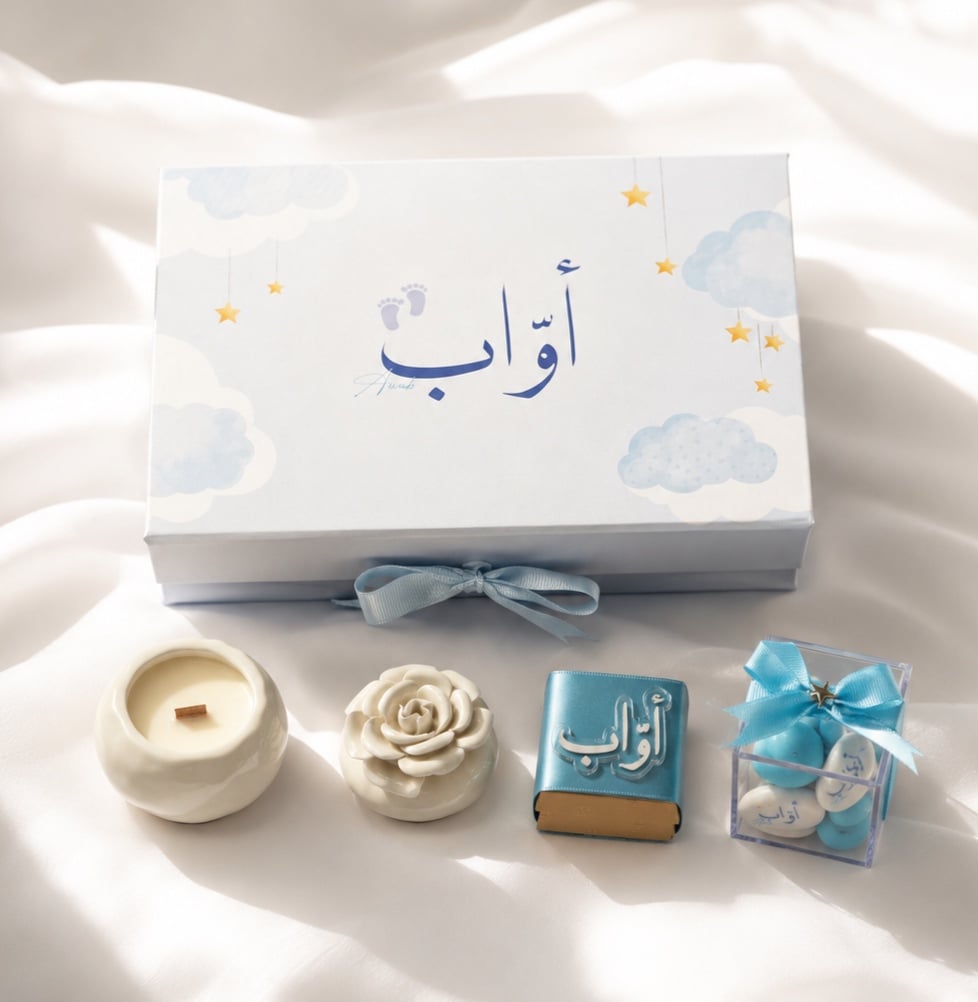 توزيعة مواليد بداخلها شمعة تشوكلت و ملبس - صورة 1