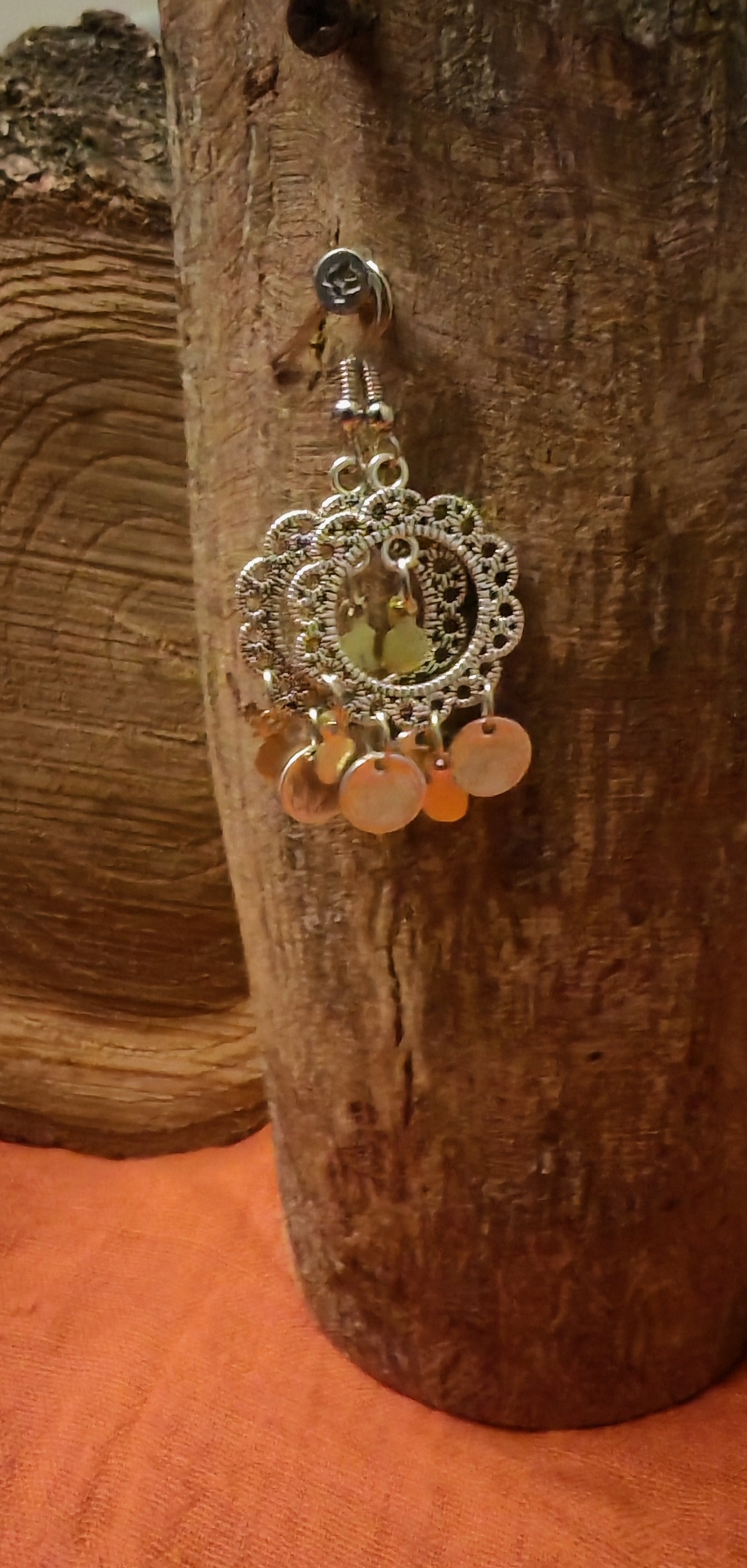 Medium sized silver color earrings with gold brass and silver pendants - Image 1