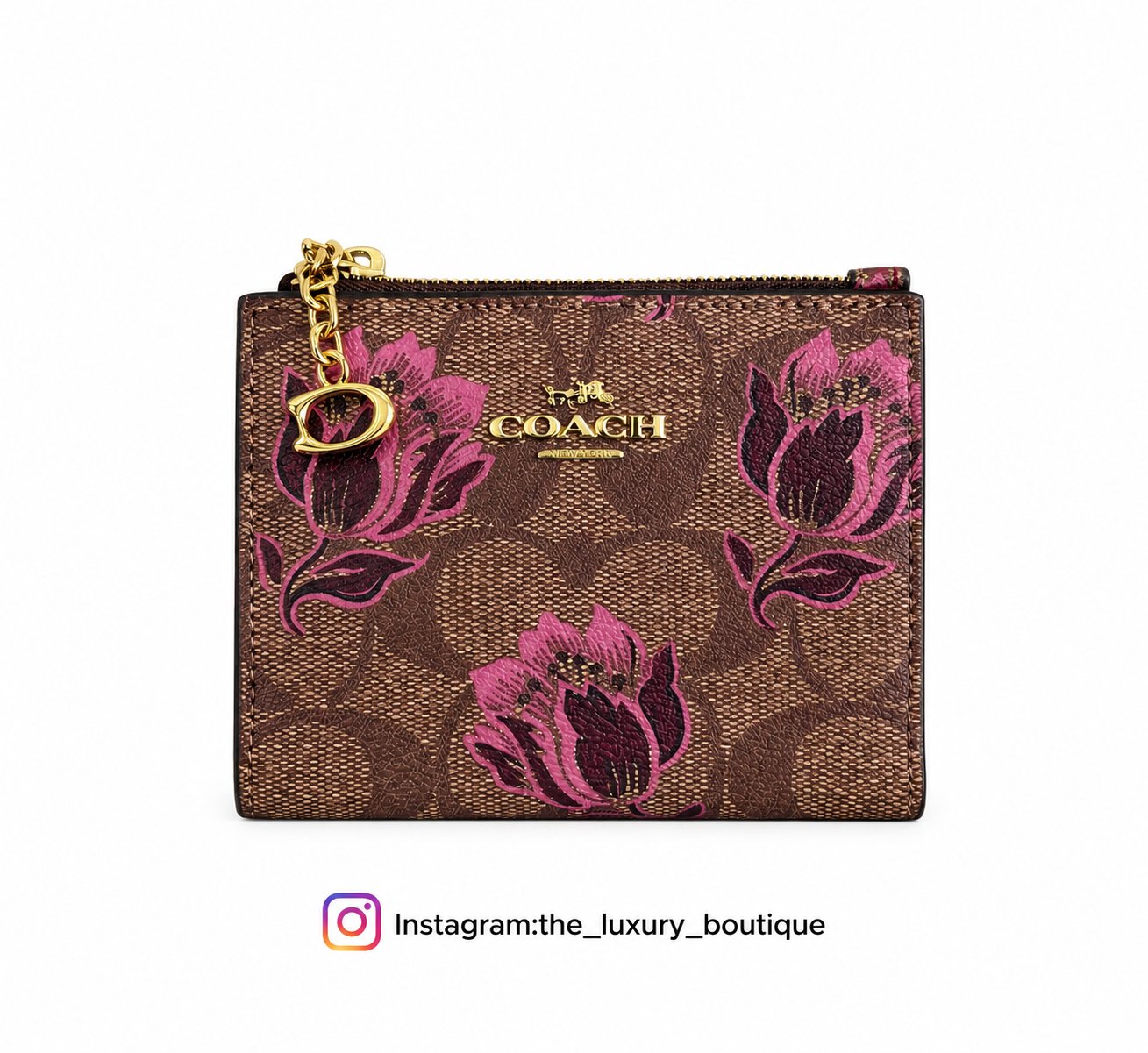 Coach bifold wallet light brown with pinkish flowers - Image 1