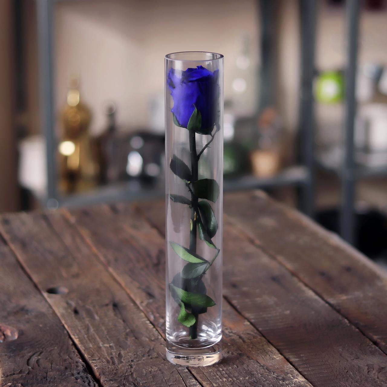 Clear Tube Vase with Blue Perpetual Rose - Image 1